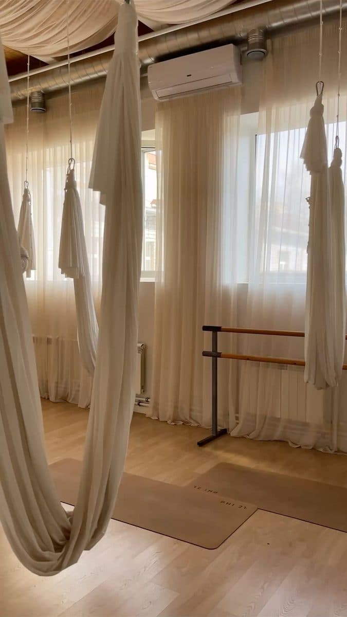 Aerial yoga in studio